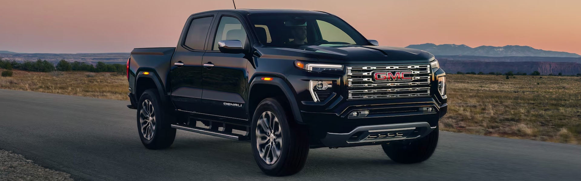 2026 GMC Canyon Elevation pickup driving through Lebanon, IN